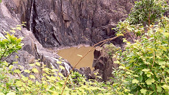 A sudden drop to a water-filled hollow